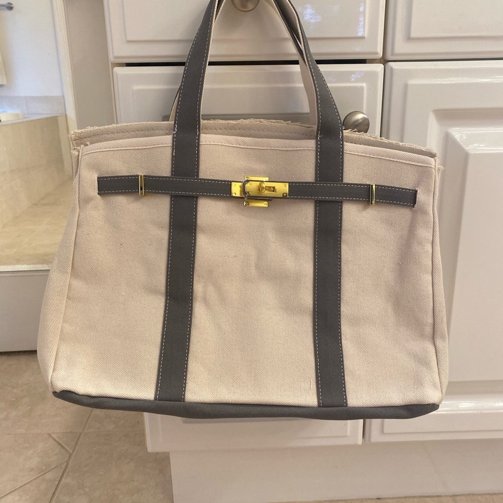 Boatkin style canvas tote with faded blue/grey straps